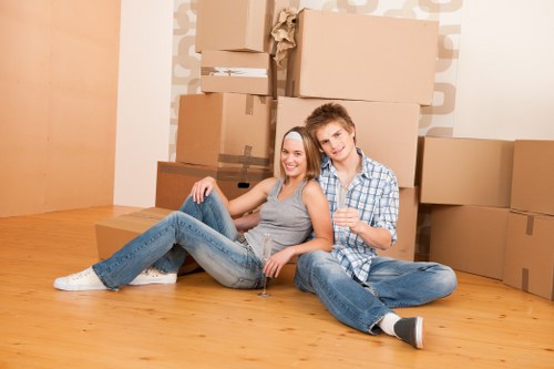 Removal workers following a health and safety policy