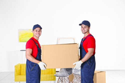 Packed furniture and boxes secured inside a removal van