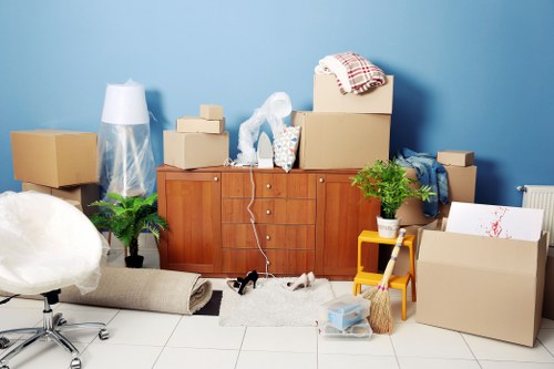 Loading household furniture into a van in Roehampton