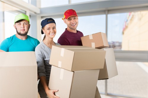Removal team preparing household items for a move in Roehampton