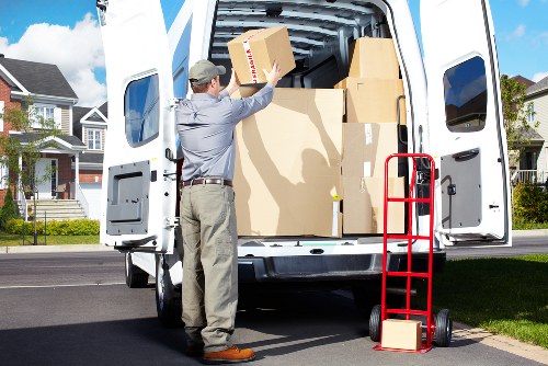 Moving crew handling furniture during a flat relocation in Roehampton