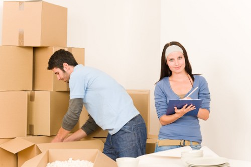 Supervisor checking safety controls during a removals job