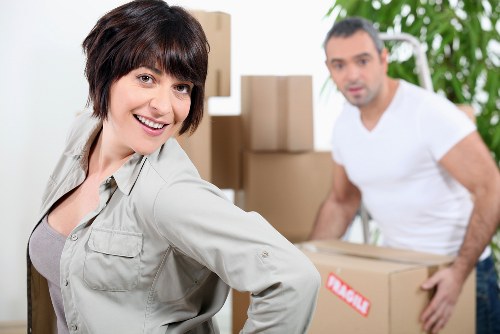 Moving crew loading furniture for a Roehampton property relocation