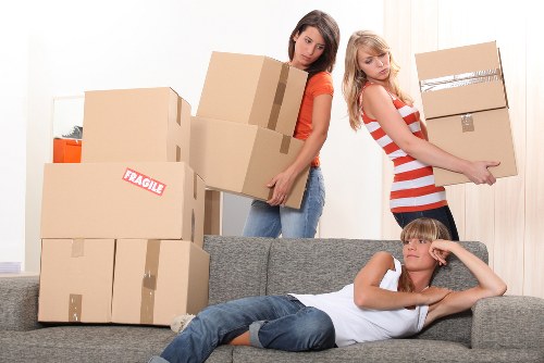 Careful packing and wrapping of furniture for removals in Roehampton