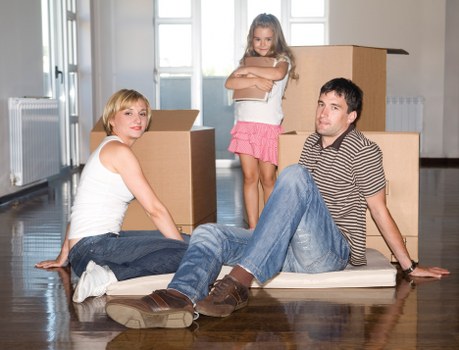 Unpacking boxes and organizing a new home in Roehampton